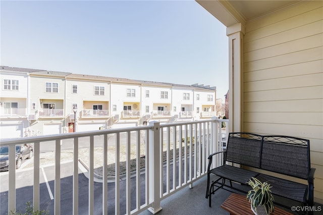 balcony featuring a residential view