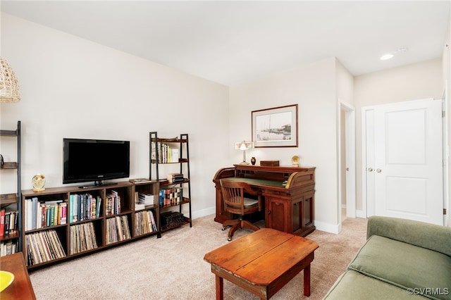 interior space with recessed lighting and baseboards