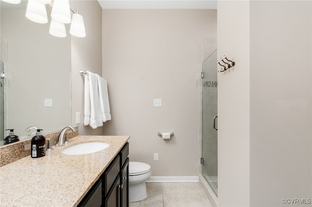 full bathroom featuring baseboards, a shower stall, toilet, and tile patterned floors