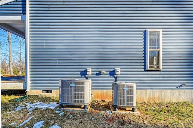 view of home's exterior featuring crawl space and central air condition unit