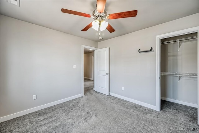 unfurnished bedroom featuring visible vents, baseboards, carpet floors, ceiling fan, and a closet