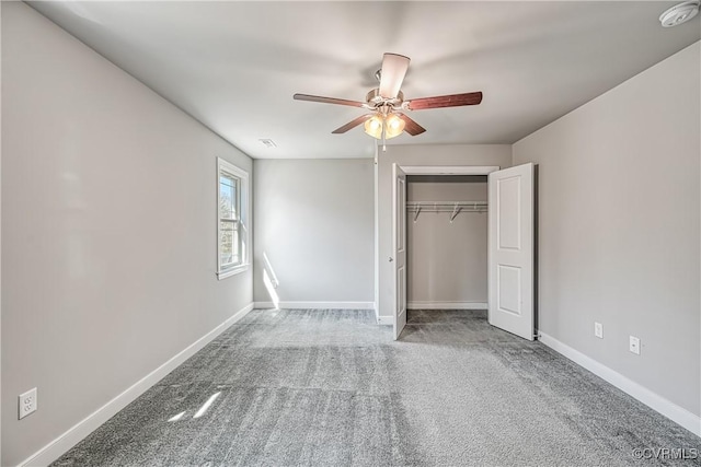 unfurnished bedroom featuring visible vents, baseboards, a ceiling fan, and carpet flooring