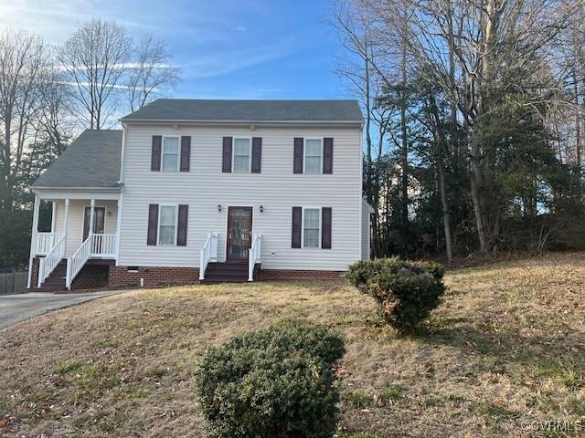 colonial inspired home with crawl space