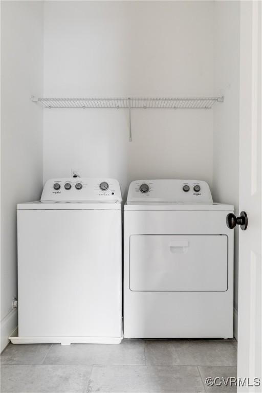 laundry area with laundry area and washer and dryer