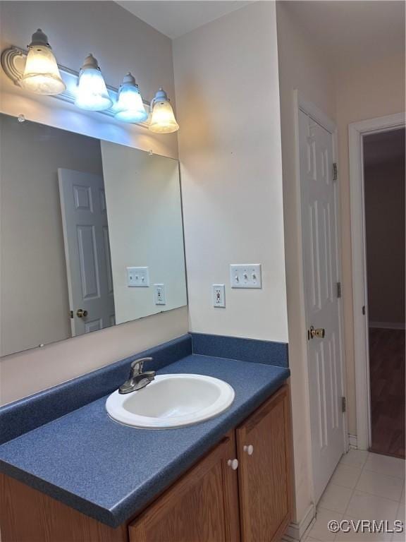 bathroom featuring vanity and tile patterned flooring