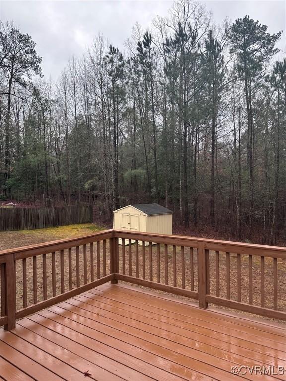 deck featuring a storage shed