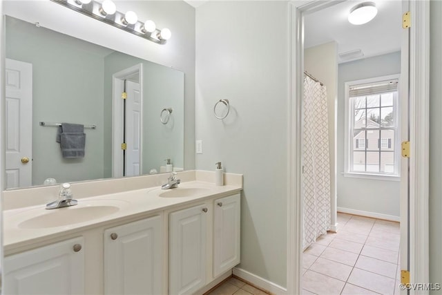 bathroom featuring tile patterned floors and vanity