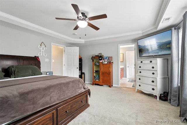 bedroom featuring light carpet, visible vents, a raised ceiling, and crown molding