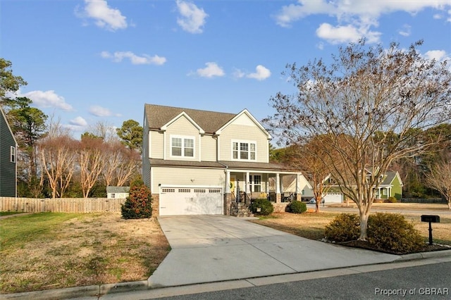 traditional-style home with driveway, an attached garage, fence, a porch, and a front yard