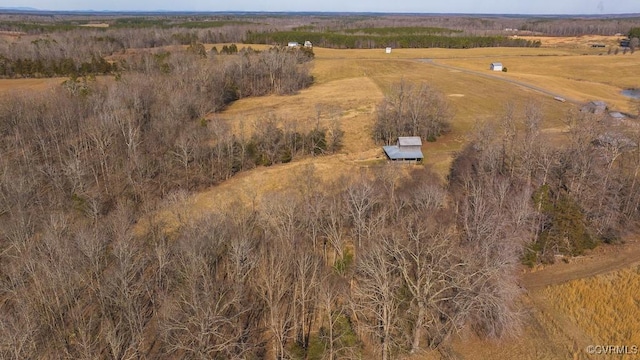 birds eye view of property featuring a rural view