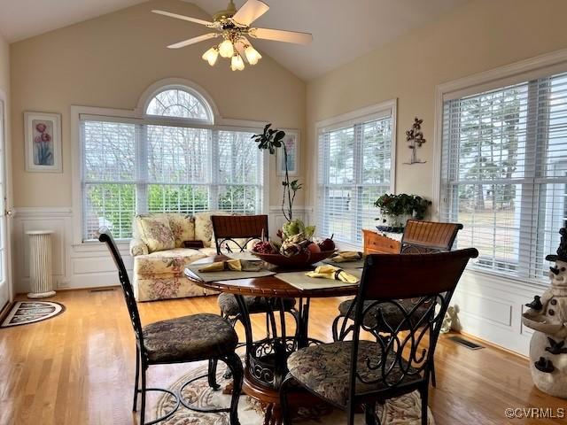 dining area featuring a wealth of natural light and light hardwood / wood-style floors