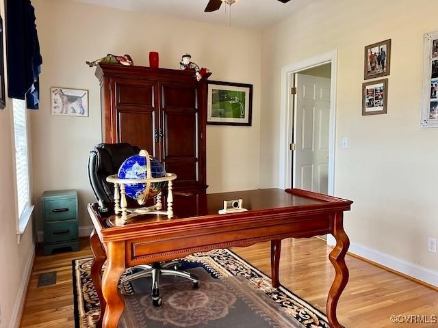 office area featuring ceiling fan and light hardwood / wood-style flooring