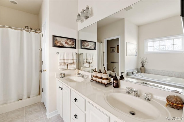 bathroom featuring tile patterned floors, vanity, and independent shower and bath