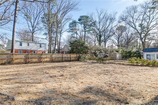 view of yard with fence