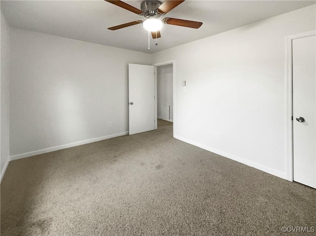 unfurnished room featuring carpet floors and ceiling fan