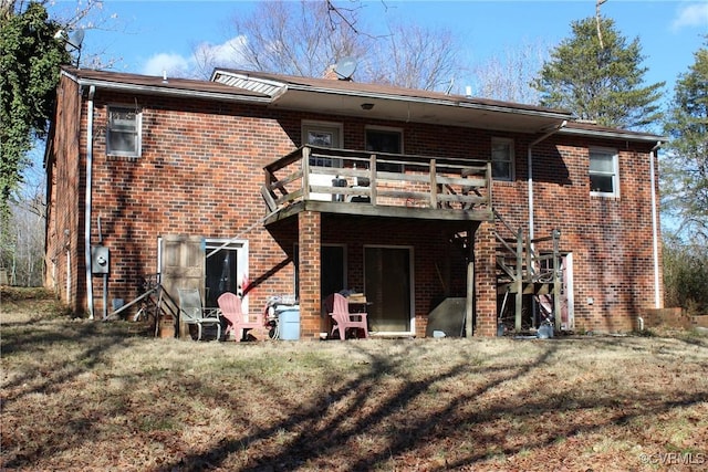 back of house with brick siding