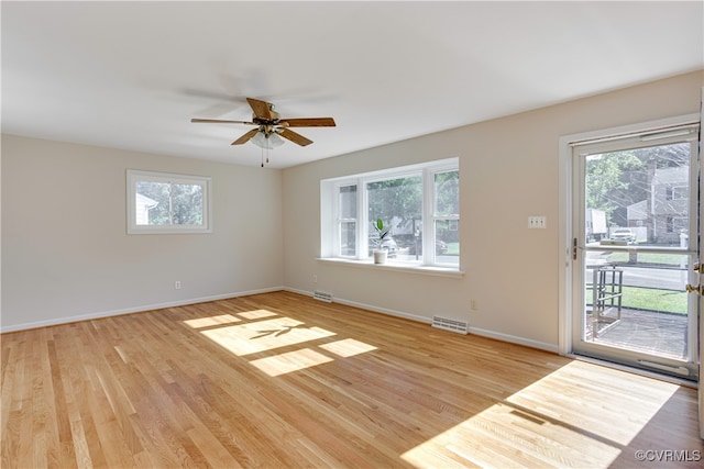 unfurnished room with ceiling fan and light hardwood / wood-style floors