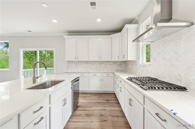 2700 Maidens Rd, Powhatan, VA 23139 - kitchen with stainless steel appliances, a sink, light stone countertops, wall chimney exhaust hood, and white cabinetry