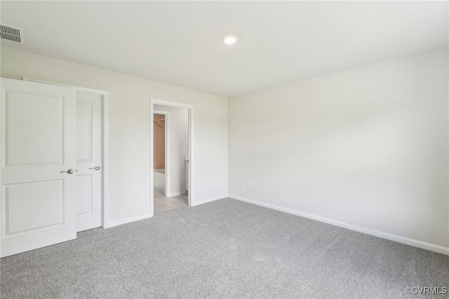 2700 Maidens Rd, Powhatan, VA 23139 - unfurnished bedroom with light carpet, baseboards, visible vents, and recessed lighting