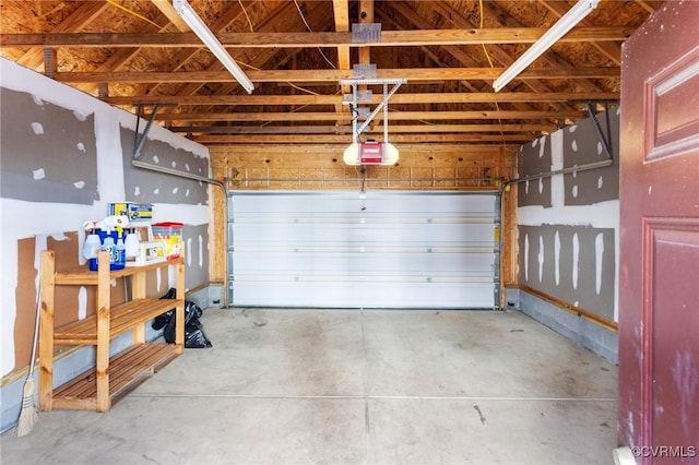 garage featuring a garage door opener