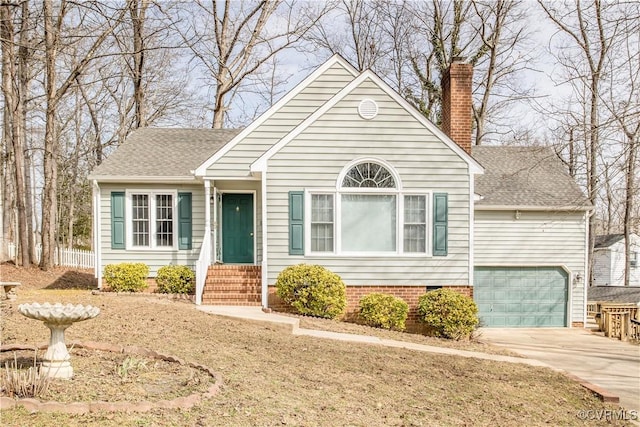 view of front of house featuring a chimney, a shingled roof, entry steps, a garage, and driveway