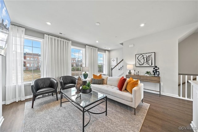 living room featuring dark hardwood / wood-style floors