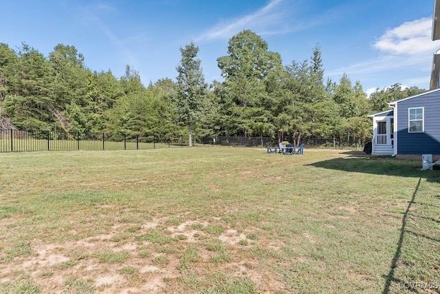 view of yard featuring entry steps and fence