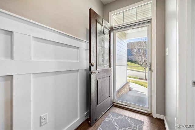 entrance foyer featuring dark hardwood / wood-style flooring