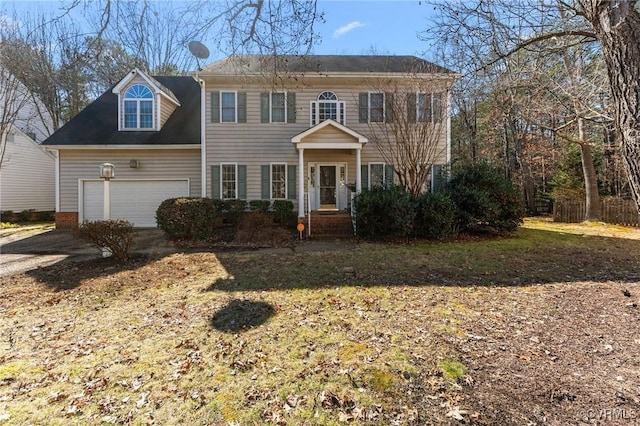 colonial home with an attached garage