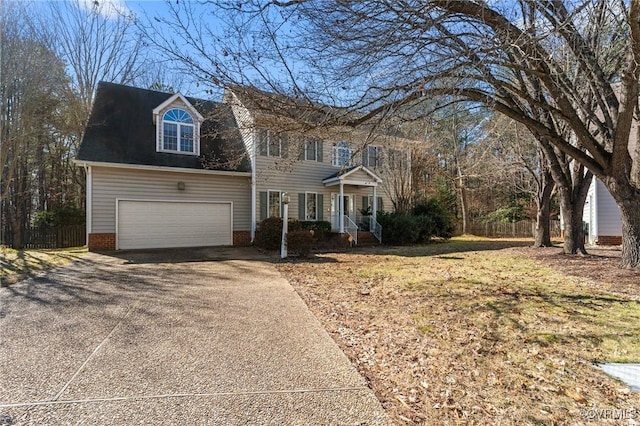 colonial home featuring driveway