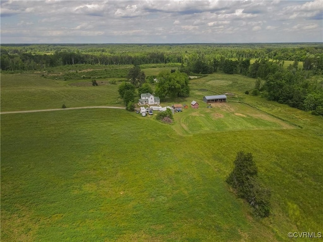 birds eye view of property with a rural view