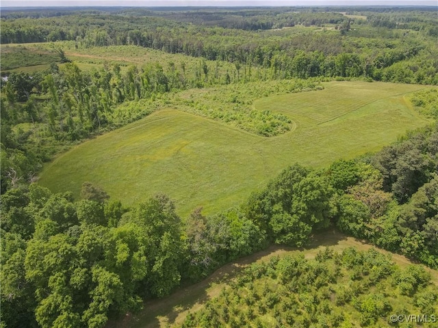 birds eye view of property featuring a rural view