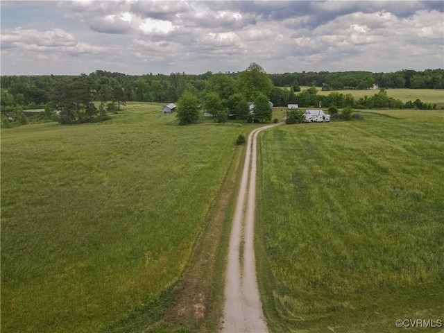 birds eye view of property featuring a rural view