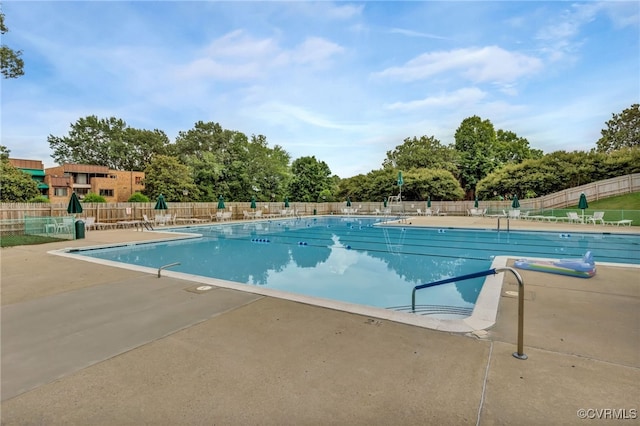 view of pool featuring a patio