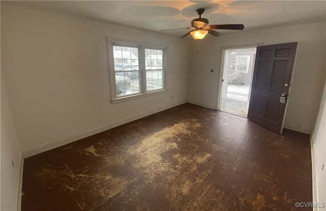 unfurnished room featuring ceiling fan