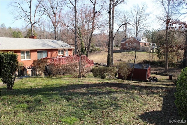 view of yard featuring a deck