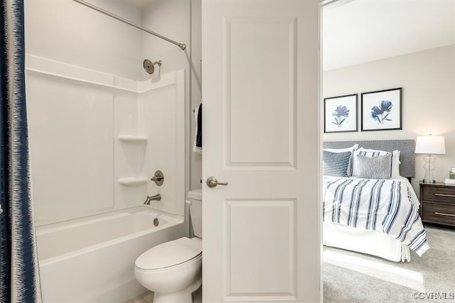 bathroom with toilet and shower / tub combo