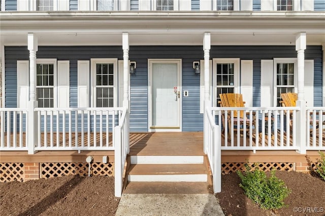 doorway to property with covered porch