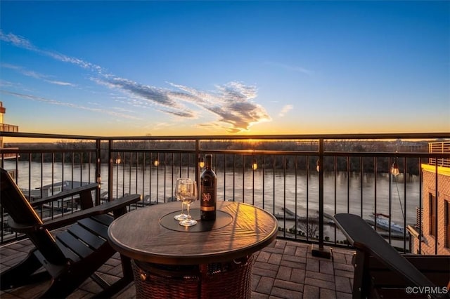 balcony featuring a water view