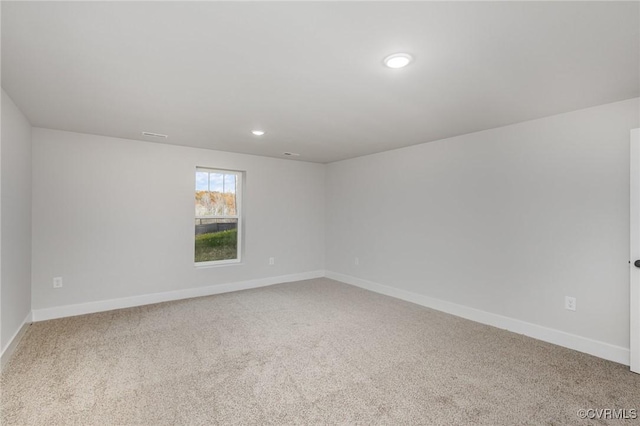 unfurnished room with carpet