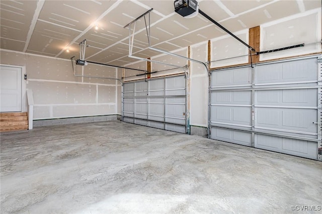 garage featuring a garage door opener