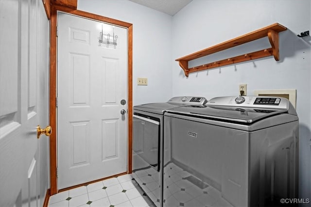 washroom with separate washer and dryer