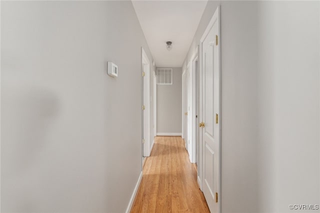 hallway featuring light hardwood / wood-style floors