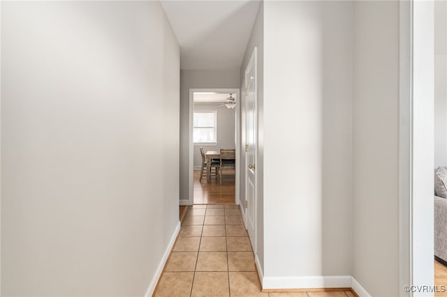 hallway with light tile patterned flooring