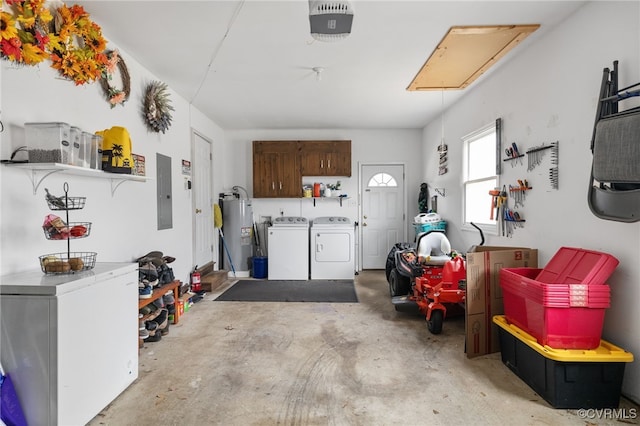 garage featuring electric water heater, electric panel, a garage door opener, washer and dryer, and fridge