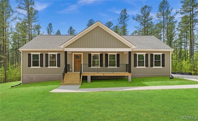 view of front of home with a front lawn and a porch