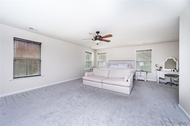 unfurnished bedroom with visible vents, ceiling fan, baseboards, and carpet floors