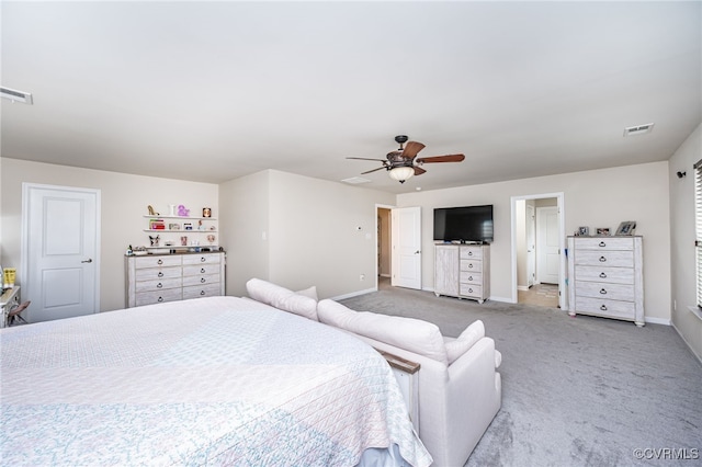 bedroom featuring visible vents, baseboards, a ceiling fan, and carpet flooring