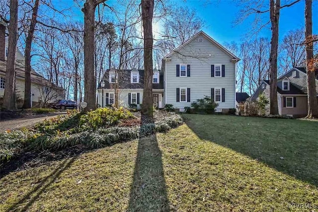 view of front facade featuring a front yard