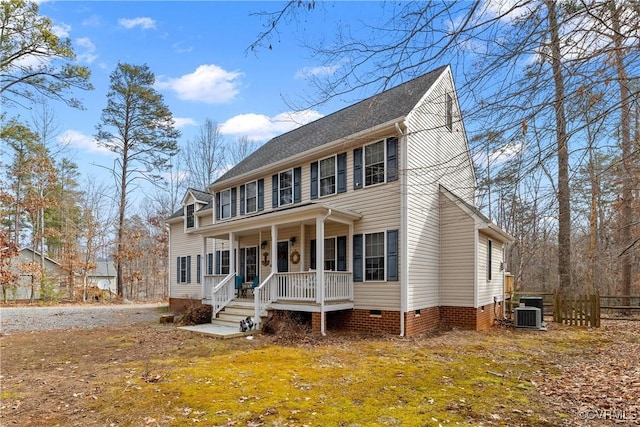 colonial-style house with covered porch and central AC